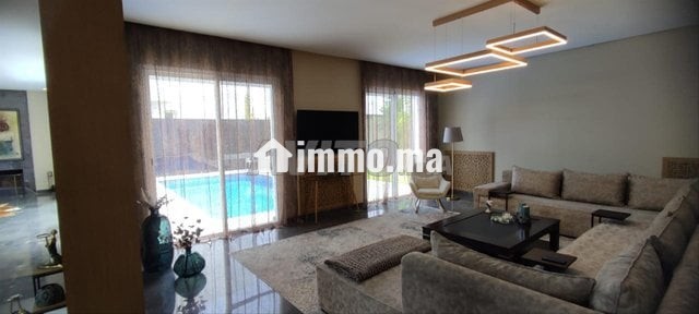 Une magnifique villa avec piscine a Hassan - Location Immobilier - Rabat - photo 5