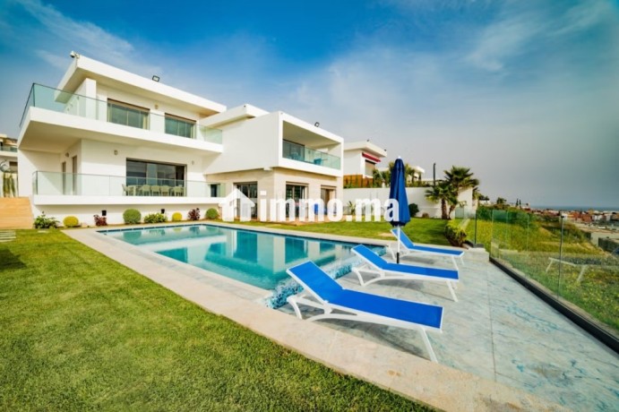 villa-de-luxe-vue-mer-a-taghazout-bay-5-suites-piscine-jardin-big-0