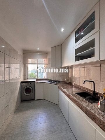 Appartement à louer 90 m² à Rabat - Location Immobilier - Rabat - photo 8