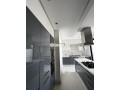 en-face-hotel-le-marly-apprt-a-racine-vide-small-3