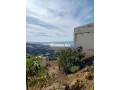 terrain-zone-ville-titre-avec-une-vue-sur-mer-small-0