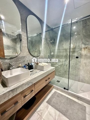 APPARTEMENT MEUBLÉ ÉTAGE ÉLEVÉ À LOUER À CFC - Location Immobilier - Casablanca - photo 7