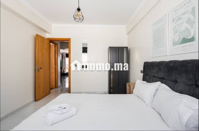 location-dun-appartement-en-hassan-centre-ville-superficie-90-m2-residence-avec-concierge-climatisation-generale-big-8
