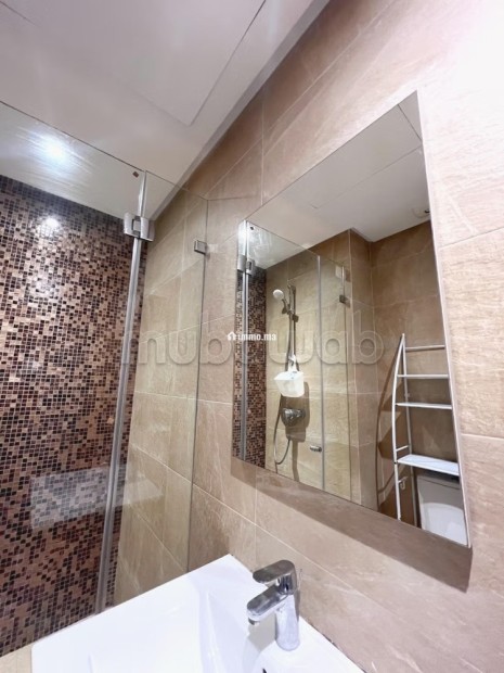 Appartement en location à Roches Noires. Surface de 58 m². Bien meublé - Location Immobilier - Casablanca - photo 6