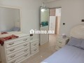 location-dun-appartement-a-chefchaouen-surface-totale-65-m2-porte-blindee-salon-marocain-small-0