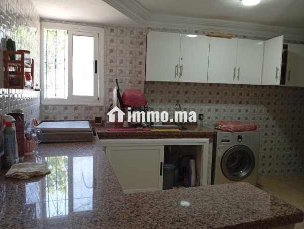 location-dun-appartement-a-chefchaouen-surface-totale-65-m2-porte-blindee-salon-marocain-big-3
