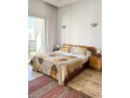 1-chambre-93m2-vue-piscine-bord-de-mer-ghandouri-small-5