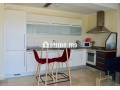 location-dun-appartement-a-asilah-surface-totale-74-m2-avec-ascenseur-et-terrasse-small-2