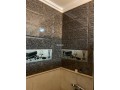location-dun-appartement-a-asilah-surface-totale-74-m2-avec-ascenseur-et-terrasse-small-4