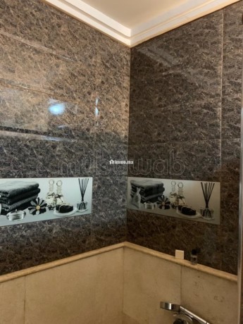 location-dun-appartement-a-asilah-surface-totale-74-m2-avec-ascenseur-et-terrasse-big-4