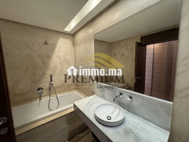 MAGNIFIQUE APPARTEMENT AVEC VUE DEGAGEE - Location Immobilier - Rabat - photo 8