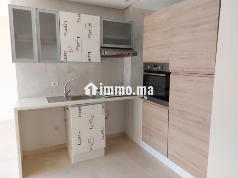 Joli appartement vide avec cuisine équipée - Location Immobilier - Casablanca - photo 3