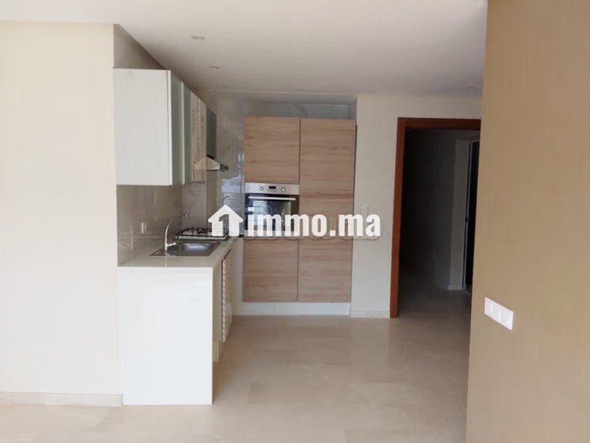 Joli appartement vide avec cuisine équipée - Location Immobilier - Casablanca - photo 5
