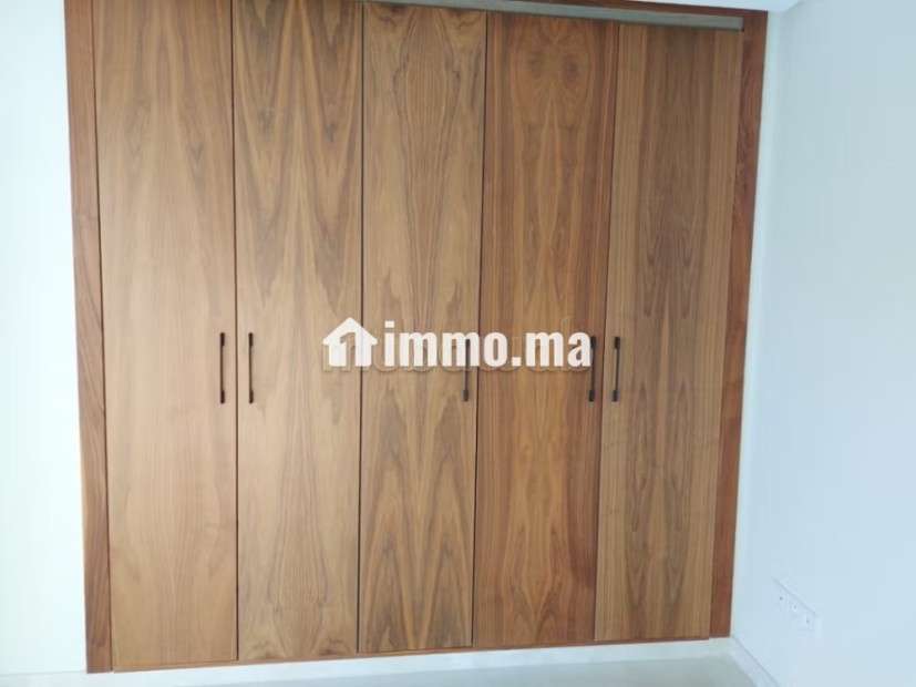 Joli appartement vide avec cuisine équipée - Location Immobilier - Casablanca - photo 8