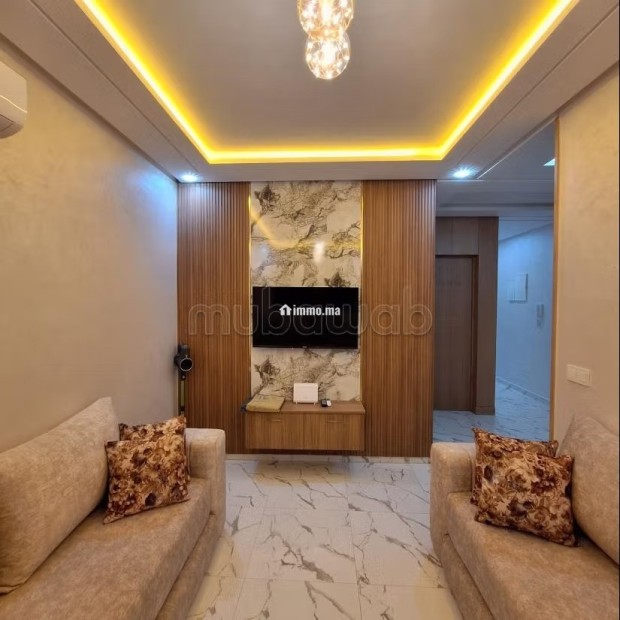 Location d'un appartement à Hay Mohammadi. Superficie 60 m². Salon typique marocain, résidence sécurisée - Vente Immobilier - Agadir - photo 1