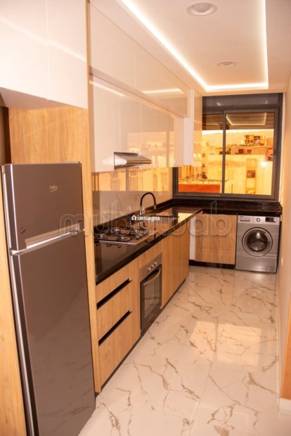 Location d'un appartement à Hay Mohammadi. Superficie 60 m². Salon typique marocain, résidence sécurisée - Vente Immobilier - Agadir - photo 4
