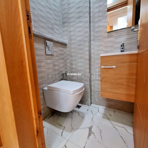 Location d'un appartement à Hay Mohammadi. Superficie 60 m². Salon typique marocain, résidence sécurisée - Vente Immobilier - Agadir - photo 5