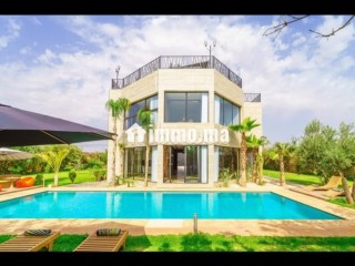 villa-de-standing-a-louer-pour-vos-vacances-a-route-de-ouarzazate-4-pieces-confortables-service-de-concierge-cheminee