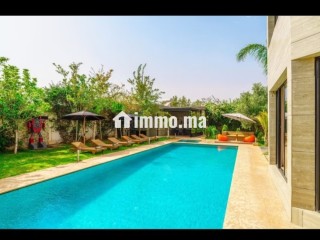 Villa de standing à louer pour vos vacances à Route de Ouarzazate. 4 pièces confortables. Service de concierge, cheminée - Villa à vendre
