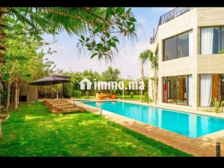 Villa de standing à louer pour vos vacances à Route de Ouarzazate. 4 pièces confortables. Service de concierge, cheminée - Villa à vendre