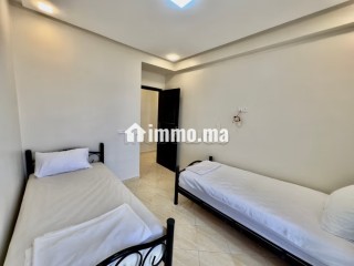 Location d'un appartement à Cité Adrar. 5 pièces confortables. Système de parabole et résidence sécurisée - Appartement à vendre - Agadir
