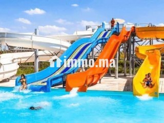Location saisonnière à Asilah. Surface de 74 m². Jardin et garage - Appartement à vendre - Asilah