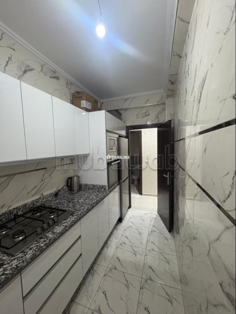 Location d'un appartement à Al Hoceima. 2 belles chambres. Salon traditionnel marocain, résidence sécurisée - Vente Immobilier - Al Hoceïma - photo 6