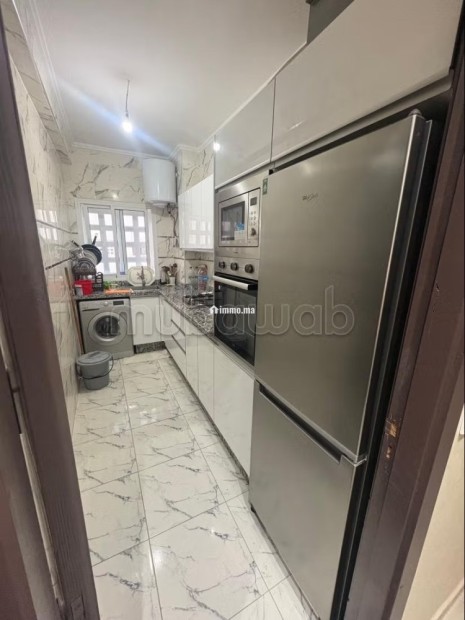 Location d'un appartement à Al Hoceima. 2 belles chambres. Salon traditionnel marocain, résidence sécurisée - Vente Immobilier - Al Hoceïma - photo 7