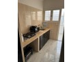 location-dun-appartement-a-agdal-surface-totale-85-m2-salon-contemporain-small-1