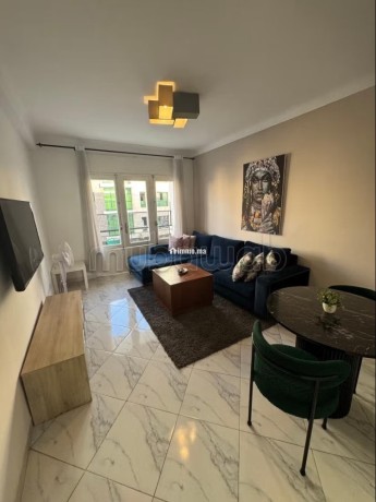 location-dun-appartement-a-agdal-surface-totale-85-m2-salon-contemporain-big-0