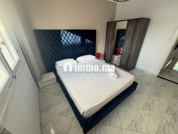 location-dun-appartement-a-agdal-surface-totale-85-m2-salon-contemporain-big-4