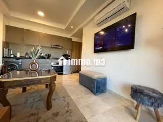 Location saisonnière à Guéliz. Superficie 80 m². Piscine et air conditionné - Appartement à vendre