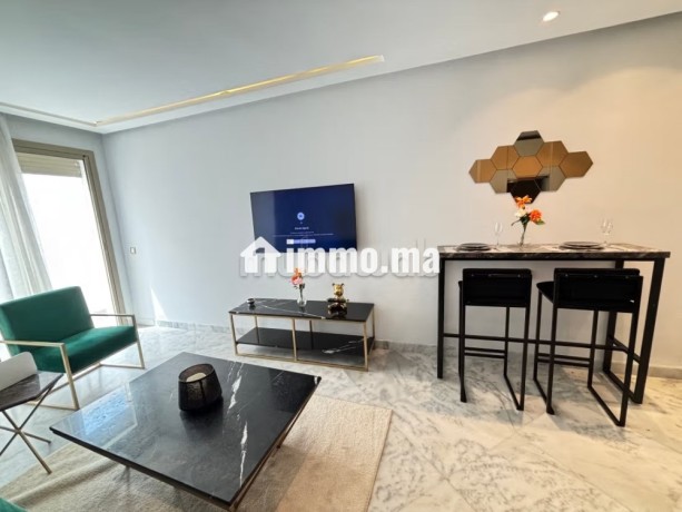 location-dun-appartement-a-maarif-1-belle-chambre-service-de-concierge-et-climatisation-big-2
