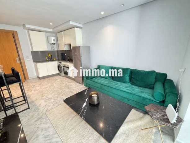 location-dun-appartement-a-maarif-1-belle-chambre-service-de-concierge-et-climatisation-big-5