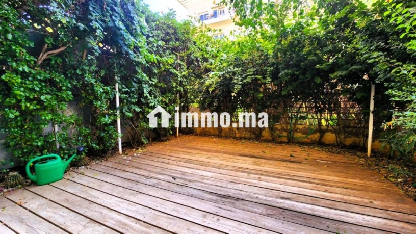 rez-de-jardin-2-chambres-vide-a-louer-a-ain-diab-big-7