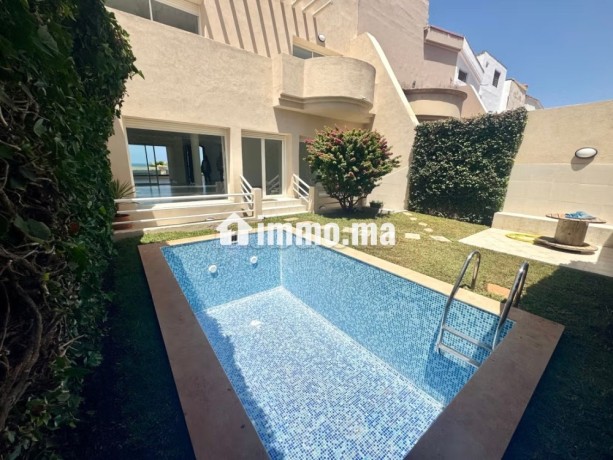 a-dar-bouaaza-somptueuse-villa-a-louer-vide-vue-mer-4-chambres-agreables-piscine-et-cheminee-big-9