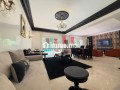 location-villa-de-haut-standing-a-ain-diab-surface-totale-400-m2-meuble-small-2