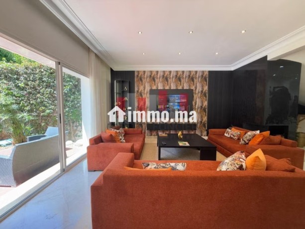 location-villa-de-haut-standing-a-ain-diab-surface-totale-400-m2-meuble-big-1
