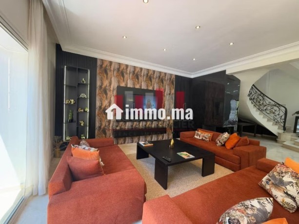location-villa-de-haut-standing-a-ain-diab-surface-totale-400-m2-meuble-big-5