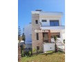 bungalow-3-facades-avec-deux-sous-sols-et-garages-small-0