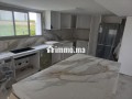 bungalow-3-facades-avec-deux-sous-sols-et-garages-small-2
