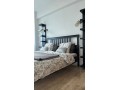location-dun-appartement-a-de-la-plage-surface-totale-95-m2-porte-blindee-salon-marocain-traditionnel-small-10