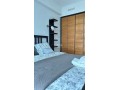 location-dun-appartement-a-de-la-plage-surface-totale-95-m2-porte-blindee-salon-marocain-traditionnel-small-11