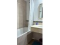 location-dun-appartement-a-de-la-plage-surface-totale-95-m2-porte-blindee-salon-marocain-traditionnel-small-14