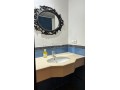 location-dun-appartement-a-de-la-plage-surface-totale-95-m2-porte-blindee-salon-marocain-traditionnel-small-15