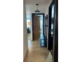 location-dun-appartement-a-de-la-plage-surface-totale-95-m2-porte-blindee-salon-marocain-traditionnel-small-16