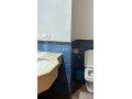 location-dun-appartement-a-de-la-plage-surface-totale-95-m2-porte-blindee-salon-marocain-traditionnel-small-17