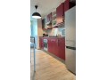 location-dun-appartement-a-de-la-plage-surface-totale-95-m2-porte-blindee-salon-marocain-traditionnel-small-18