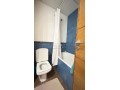 location-dun-appartement-a-de-la-plage-surface-totale-95-m2-porte-blindee-salon-marocain-traditionnel-small-8