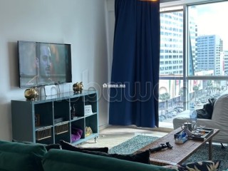 location-dun-appartement-a-de-la-plage-surface-totale-95-m2-porte-blindee-salon-marocain-traditionnel